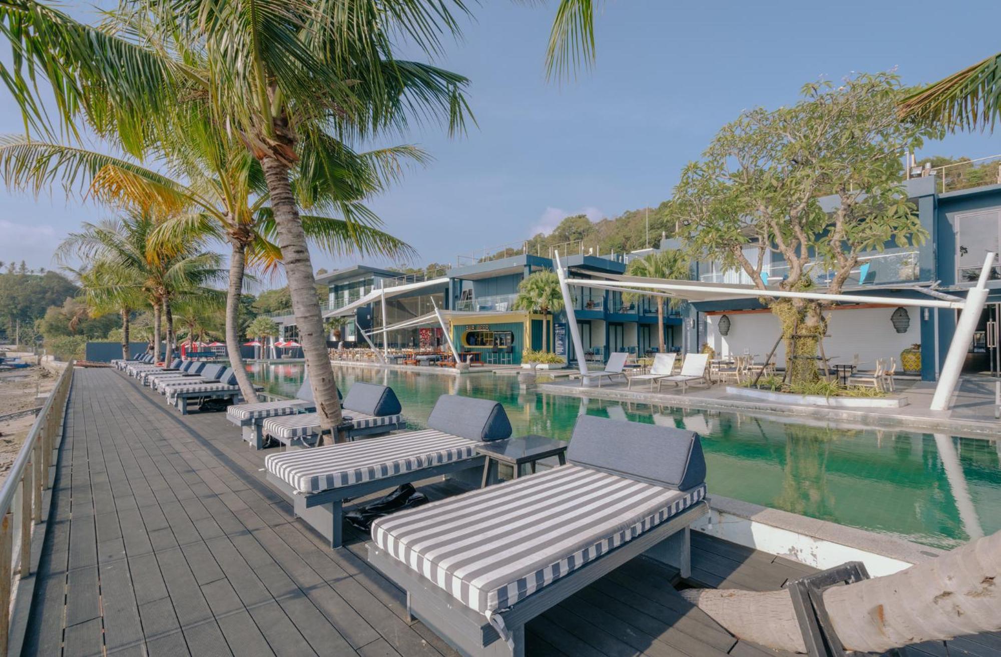 Hotel Tide Phuket Beachfront Exterior photo The resort's pool