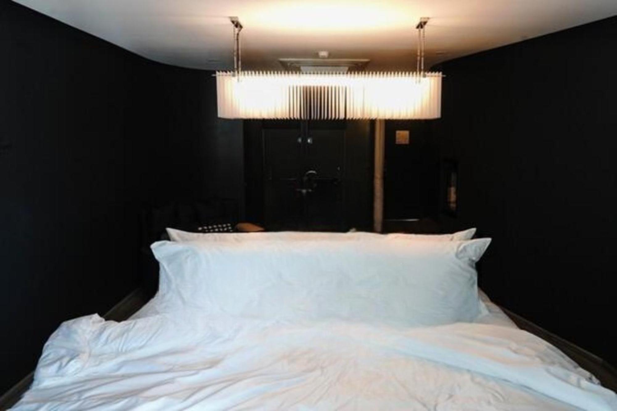 Hotel Tide Phuket Beachfront Exterior photo A bedroom at the Standard East Village