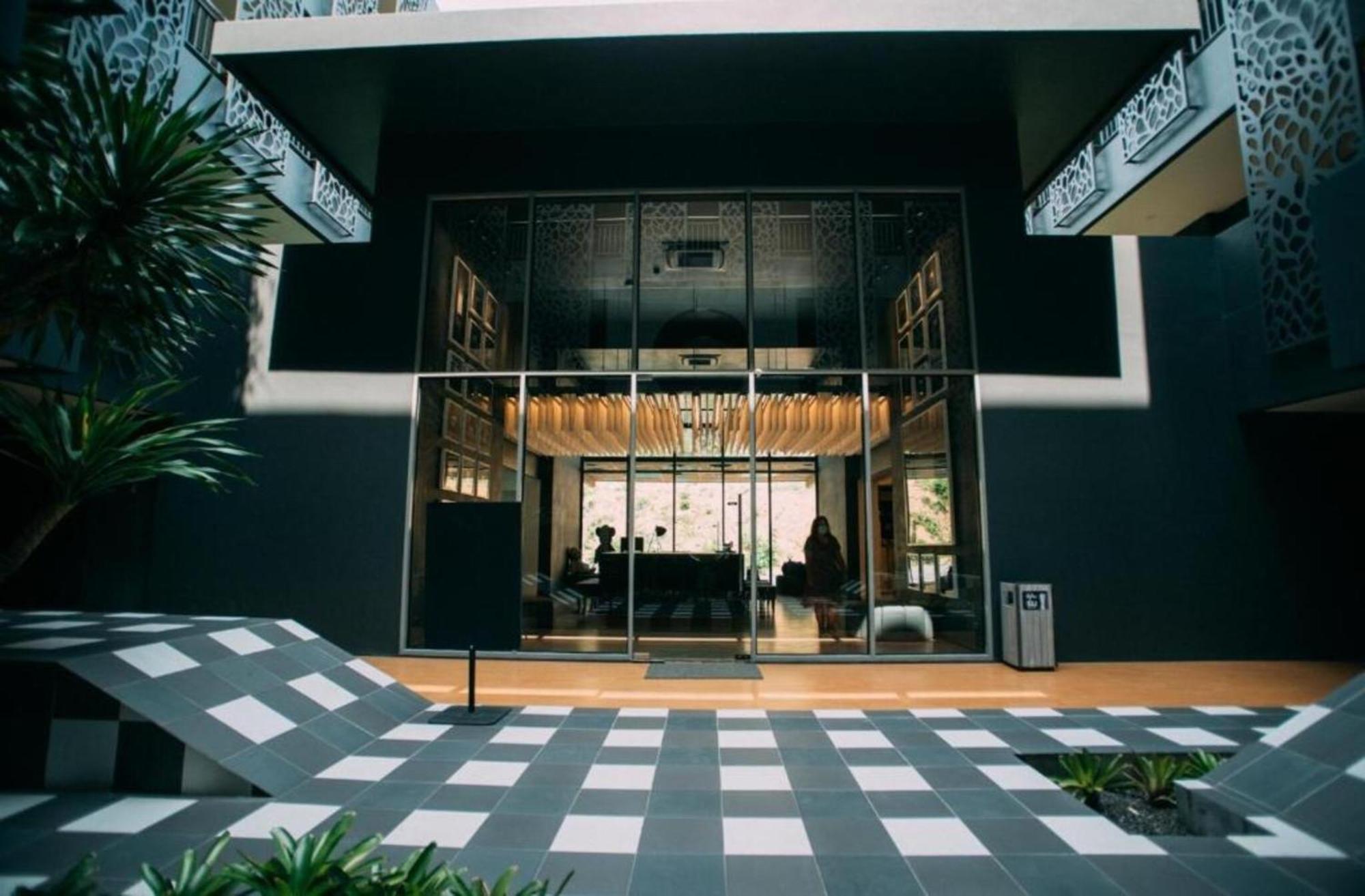Hotel Tide Phuket Beachfront Exterior photo The entrance of the hotel