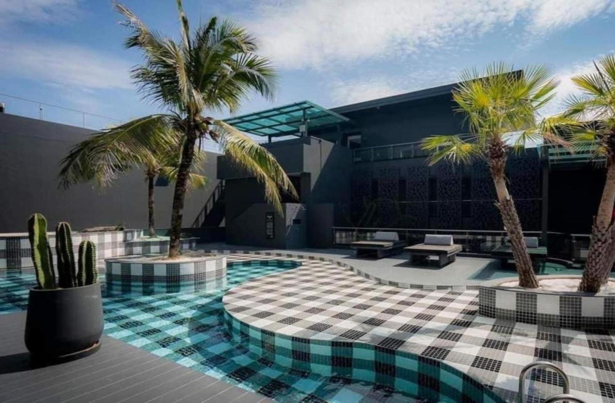 Hotel Tide Phuket Beachfront Exterior photo The pool at the hotel